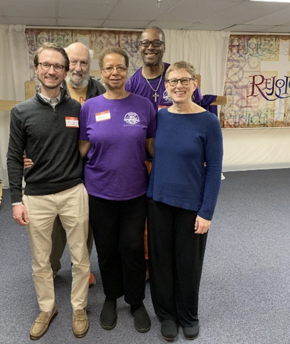Dr. Van Haren pictured with Community partners after his presentation