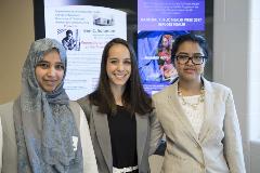 MPH Gamma Rho Honor Society students Banan Alamoudi, Alexa Gudelsky, and Jabeen Taiba organize a guest speaker event..