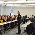 Students, staff, and faculty attending Police Chief Thomas W. Synan Jr.’s presentation. 