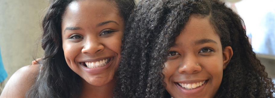 2 black women smiling