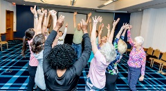 People with hands up