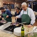 Image from Turner Farm teaching kitchen three people cooking a healthy meal