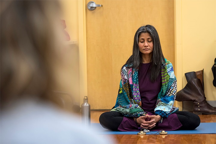 sitting person practicing mindfulness