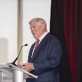 A man speaking at a podium