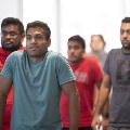Men doing group functions