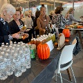 People at reception standing at serving table