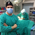 Surgeons with UC head bandana