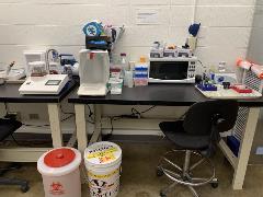 Image of CASB providing a fully stocked work area for the safe handling, preparation, and disposal of uranyl-salt solutions needed for preliminary sample analysis.