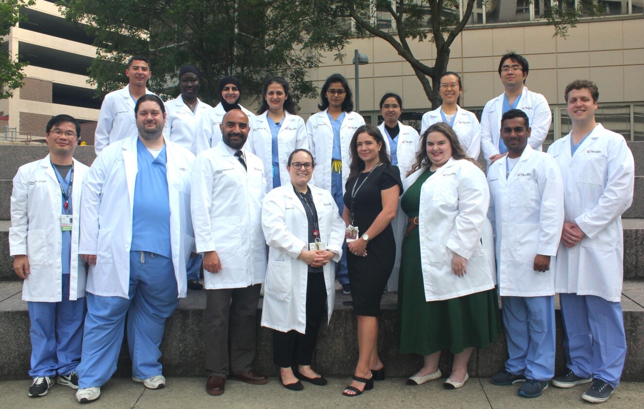 New resident photo with all 12 residents and program leadership