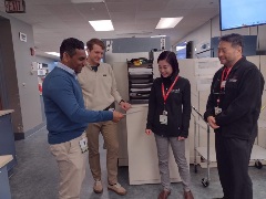 Sachie Dr Oh Vinay Karl standing in the lab