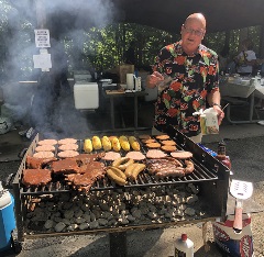 Photo of Bill Williams at the grill