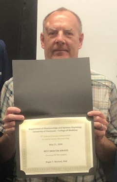 roger worrell with award