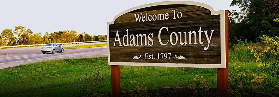 Image of Adams County welcome sign