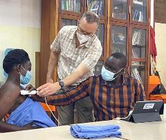 Jon Jacobson, MD performs outreach in rural Uganda.